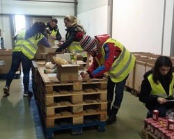 Sort out donated food for people in need in February