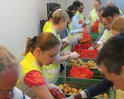 Sort out donated food for people in need in March