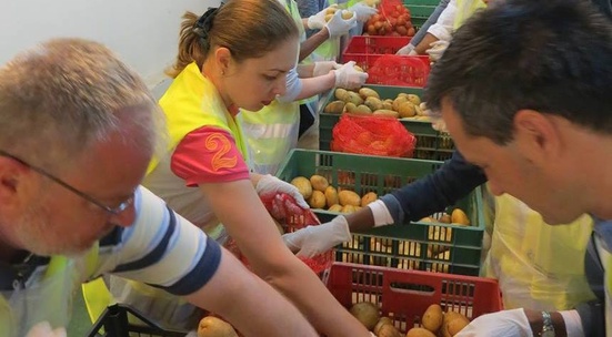 Sort out donated food for people in need in December