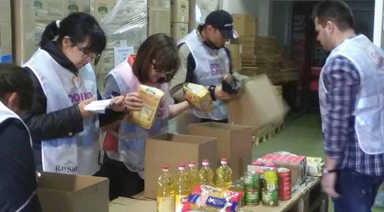 Sort out donated food for people in need in April